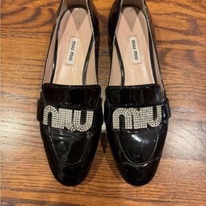 Miu Miu Shiny Black Loafers with Crystal Logo